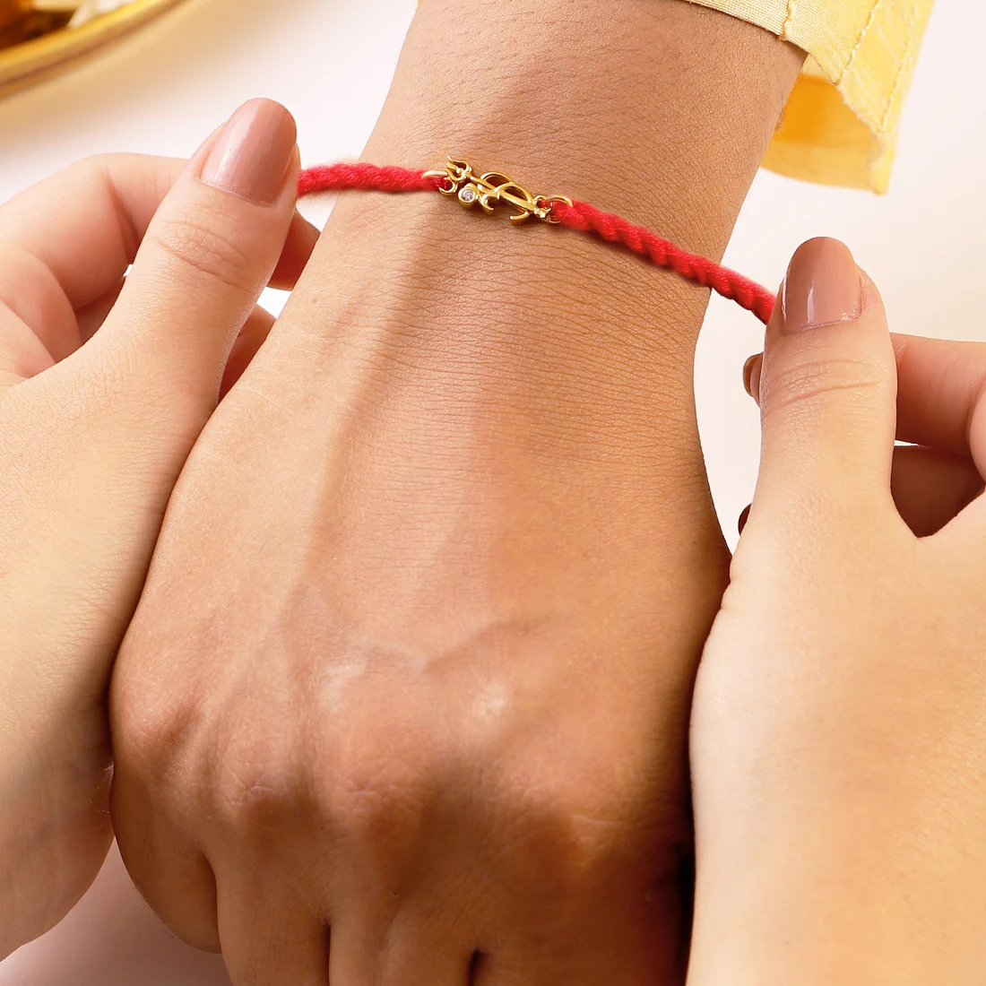 Golden Om Bond Gold-Plated 925 Sterling Silver Rakhi with Tassle - Image 5